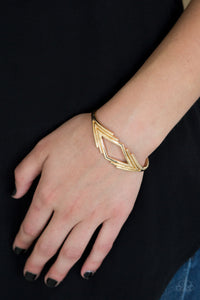 In Total Denile - Gold Paparazzi